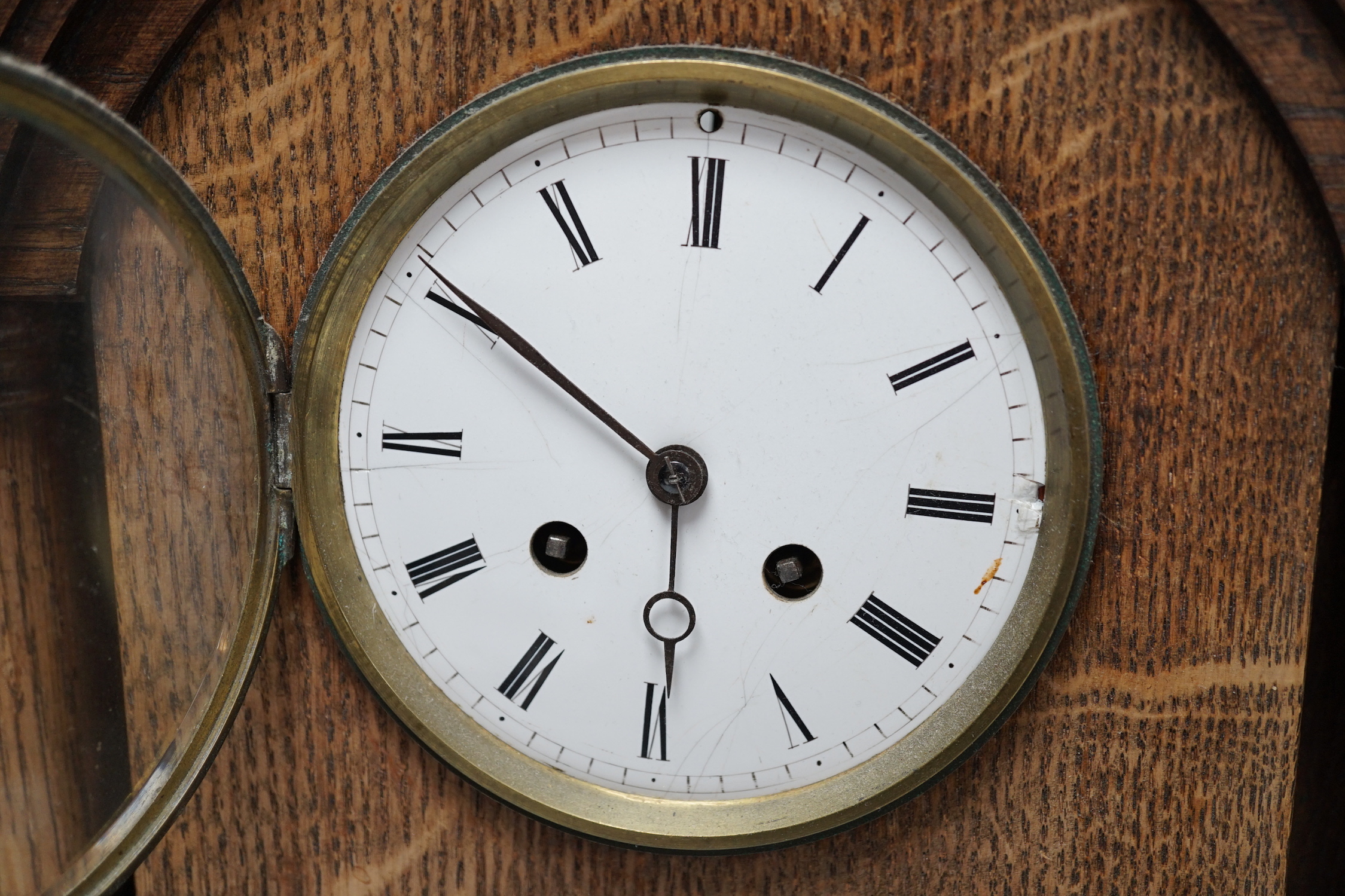 A 1920’s oak mantel clock, French gong-striking movement, 39cm high